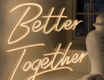 Cartel de Better de acrílico con neón LED en Moreno